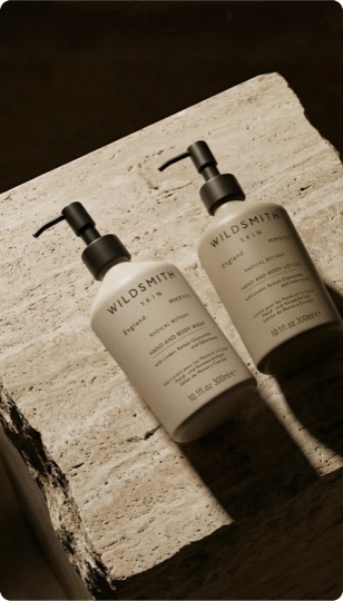 AI product photography — skincare pump bottles on stone